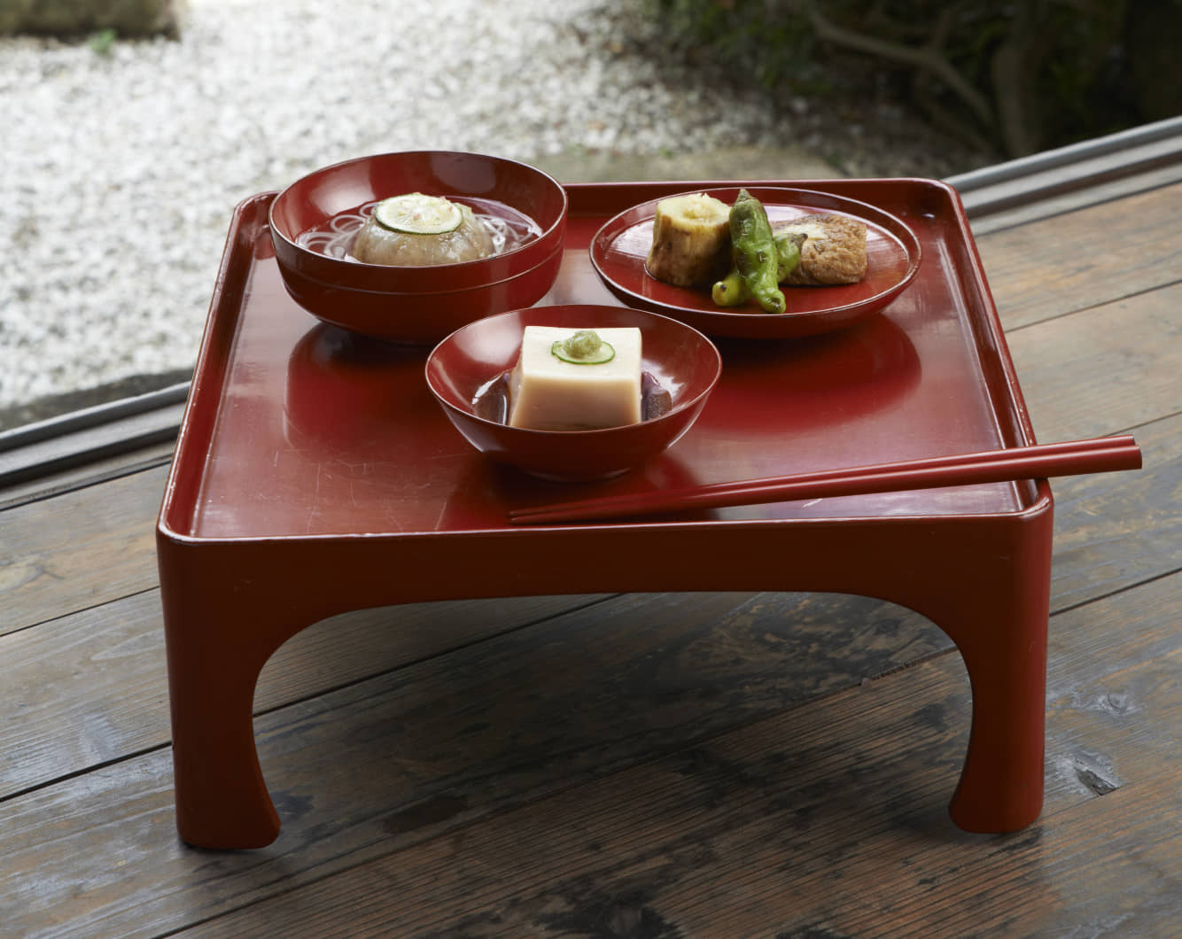 Perfect plating: A red lacquerware tray holds three delicate shōjin ryōri (vegan temple cuisine) dishes reminiscent of the season. | NANCY SINGLETON HACHISU
