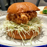 Fresh classic: To mark its rebirth, Delifucious has added a tuna cutlet burger to its menu. | ROBBIE SWINNERTON