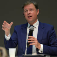 Paul Simpson, CEO of CDP, speaks during a forum on decarbonizing management held in Tokyo on Nov. 19. | YOSHIAKI MIURA