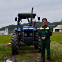 Satoshi Tanaka, the head of Tanaka Nojo, cultivates land leased from other farmers. | SHINOBU YAMADA