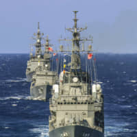 Maritime Self-Defense Force ships sail in formation on Nov. 19 in the Philippines Sea . | DESTROYER SQUADRON 15