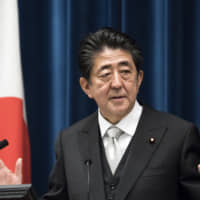 Prime Minister Shinzo Abe is launching a fiscal stimulus plan to prop up the economy in the wake of October\'s consumption tax hike. | BLOOMBERG