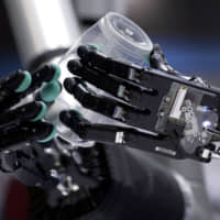 The Tactile Telerobot system is demonstrated at CEATEC (Combined Exhibition of Advanced Technologies) 2019 in Chiba on Oct. 16. | BLOOMBERG
