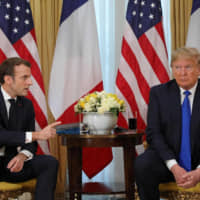 French President Emmanuel Macron meets his U.S. counterpart, Donald Trump, on Tuesday in London, where the two leaders are attending the NATO summit. | AFP-JIJI