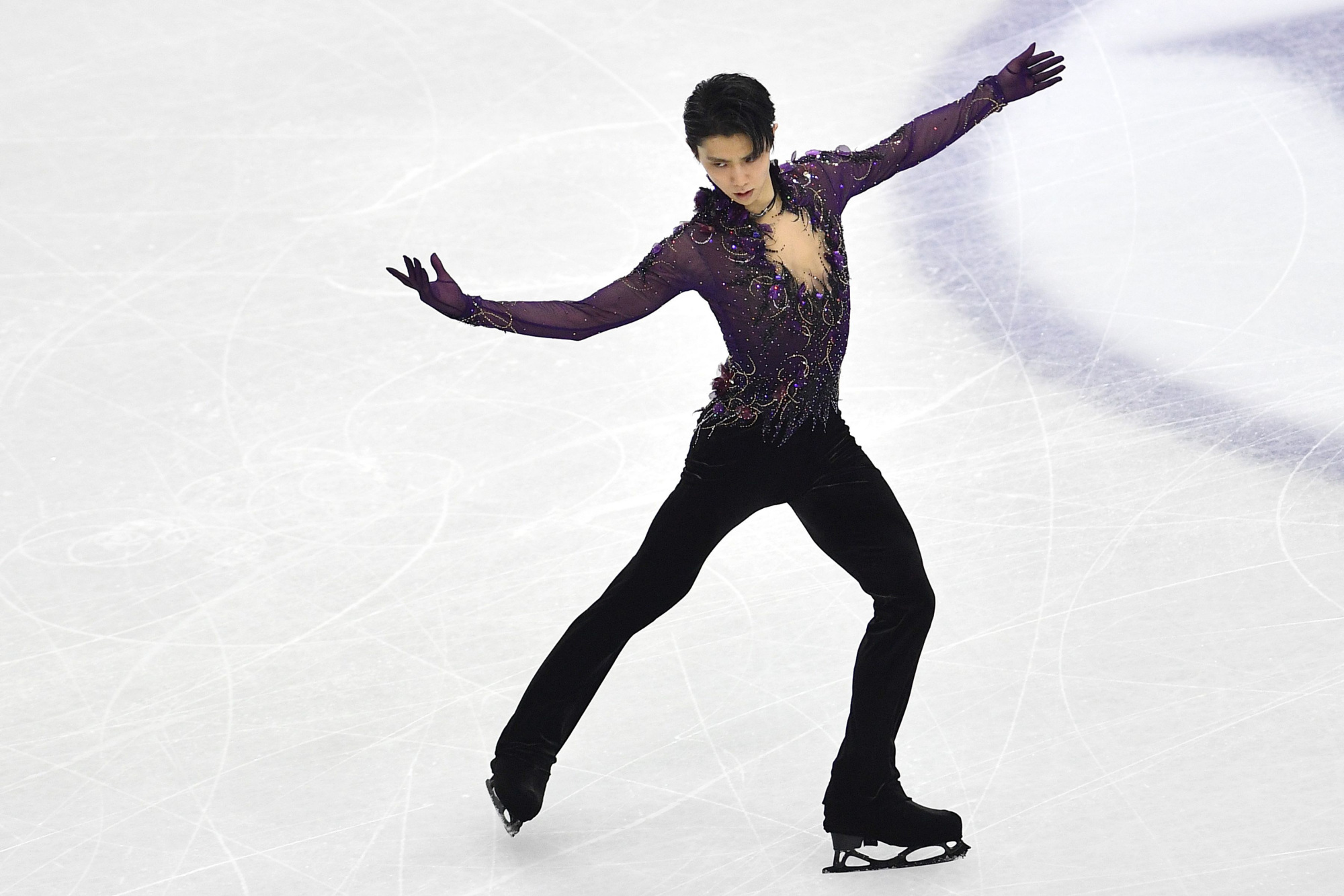 Two-time Olympic champion Yuzuru Hanyu lost to Nathan Chen in the Grand Prix Final on Saturday despite landing five quadruple jumps in his free skate. | AFP-JIJI