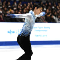 Yuzuru Hanyu performs his short program to \"Otonal\" at the Japan Championships on Friday night at Yoyogi National Gymnasium. Hanyu leads the field with 110.72 points. | RISA TANAKA