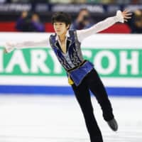 Shun Sato, a 15-year-old from Sendai, captured the Junior Grand Prix title on Saturday with a stunning free skate. | KYODO