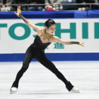 Satoko Miyahara, a four-time national champion, competes in the women\'s short program on Thursday at nationals. | RISA TANAKA