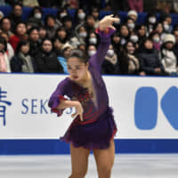Wakaba Higuchi performs her free skate to \"Poeta\" on Saturday at the national championships. Higuchi placed second with 206.61 points. | RISA TANAKA