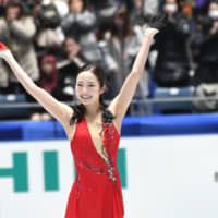 Marin Honda salutes the crowd after her short program performance on Thursday. | RISA TANAKA