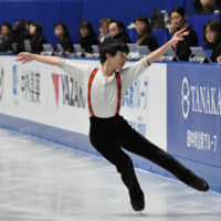 Yuma Kagiyama performs his free skate on Sunday. The 16-year-old finished in third. | RISA TANAKA