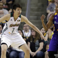 Seattle\'s Ramu Tokashiki defends Los Angeles\' Alana Beard in the first half of Saturday\'s game in Seattle. AP | AP