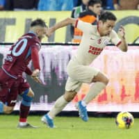Galatasaray defender Yuto Nagatomo moves the ball during a match against  Trabzonspor on Sunday in Trabzon, Turkey. | KYODO