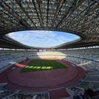 The newly completed National Stadium will host key events at the 2020 Tokyo Olympic and Paralympic Games. | KAZUHIRO KOBAYASHI