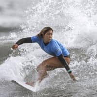 Surfer Amuro Tsuzuki is seen in a May file photo in Miyazaki Prefecture. | KYODO