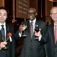 Ambassador of the Republic of Kenya S.K. Maina, MBS (center) joins State Minister for Foreign Affairs Keisuke Suzuki (left) and Chairman of Toyota Tsusho Corp. and Honorary Consul of Kenya Jun Karube (right) in Nagoya during a reception for the 56th independence anniversary of Kenya at the Conrad Tokyo on Dec. 12. | YOSHIAKI MIURA