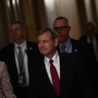 U.S. Supreme Court Chief Justice John Roberts arrives during the impeachment trial of U.S. President Donald Trump on Capitol Hill Wednesday in Washington. | AFP-JIJI