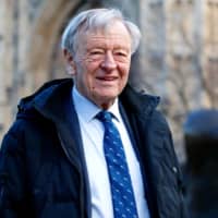 Lord Alf Dubs poses for a photograph outside the Houses of Parliament in London Monday. The British lawmaker who fled Nazi Germany as a little boy warned on Monday that a change in government policy after Brexit could put other child refugees in danger. Dubs, an opposition member of the House of Lords, wants to stop a watering down of the government\'s future commitments to unaccompanied children. | AFP-JIJI