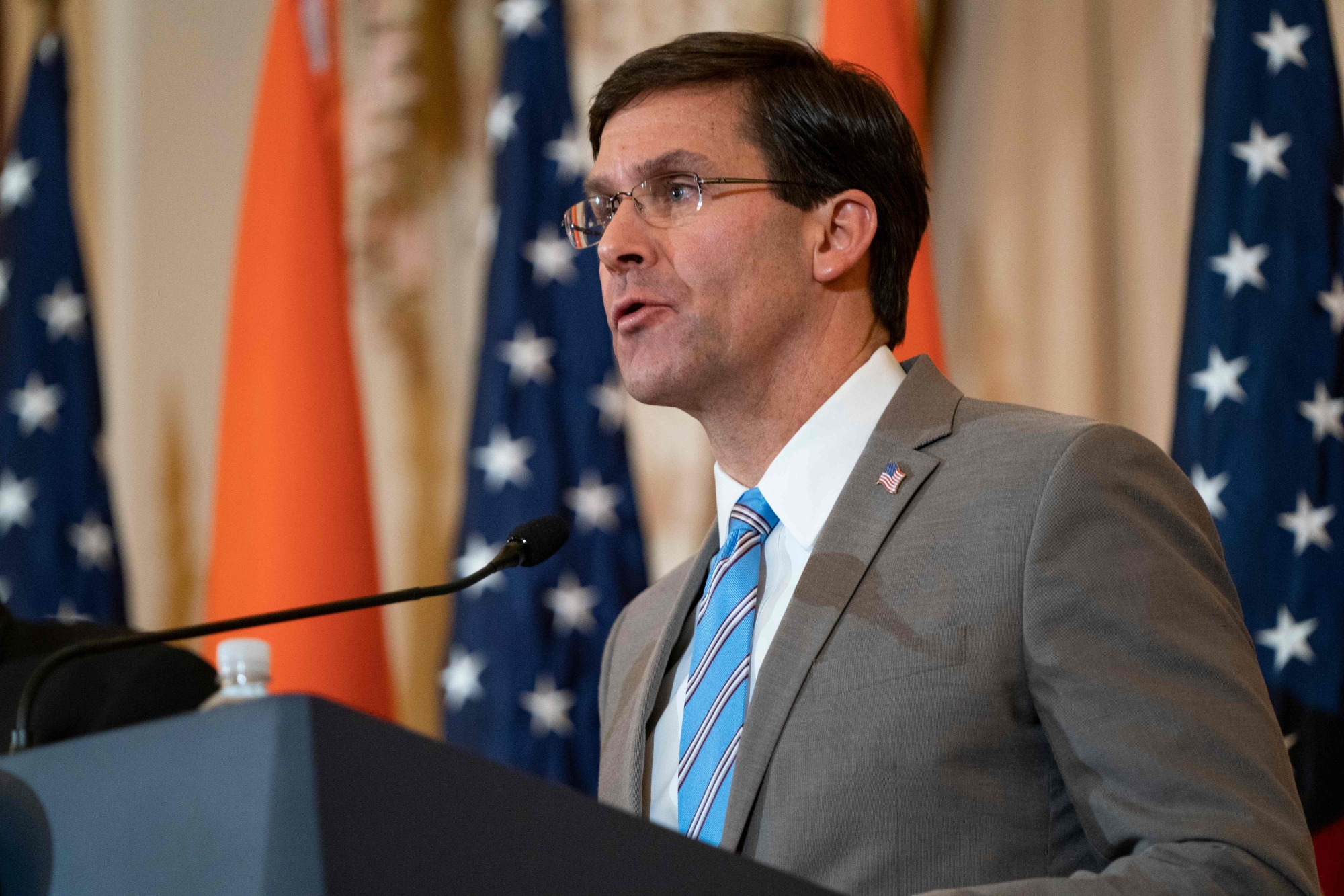 U.S. Defense Secretary Mark Esper participates in a press conference at the State Department in Washington Dec. 18. The Pentagon warned Thursday that the Iran-backed Kataeb Hezbollah group that stormed the U.S. Embassy in Baghdad would carry out more attacks on U.S. facilities &#8212; and would regret it. | AFP-JIJI