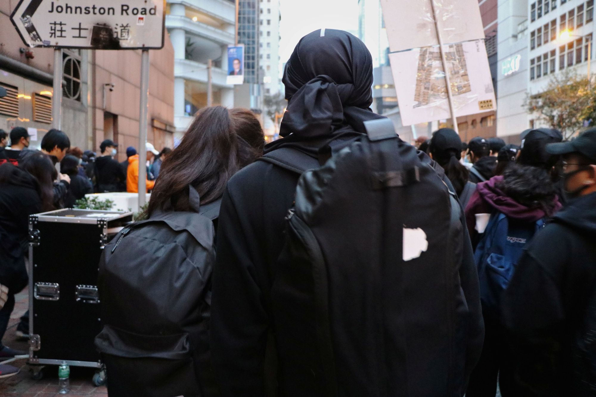 Front-line protesters Wing, 18, and Tony, 18, during a protest in Hong Kong this month. The started dating after attending many protests together. | REUTERS