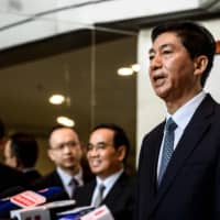 Luo Huining, the new head of the Hong Kong Liaison Office who started work in his new post Monday, speaks with media representatives the same day. Beijing\'s new top envoy to Hong Kong said he hopes the protest ravaged city will soon \"return to the right path.\" | AFP-JIJI