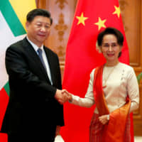 Chinese President Xi Jinping and Myanmar State Counselor Aung San Suu Kyi at the Presidential Palace in Naypyitaw on Saturday | POOL / VIA REUTERS