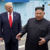 U.S. President Donald Trump meets with North Korean leader Kim Jong Un at the Demilitarized Zone separating the two Koreas, in Panmunjom, South Korea, on June 30. | REUTERS