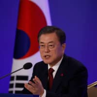 South Korean President Moon Jae-in speaks during his New Year\'s news conference at the presidential Blue House in Seoul on Tuesday. | AFP-JIJI