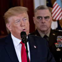 U.S. President Donald Trump delivers remarks following missile attacks by Iran on U.S. bases in Iraq on Wednesday. | BLOOMBERG