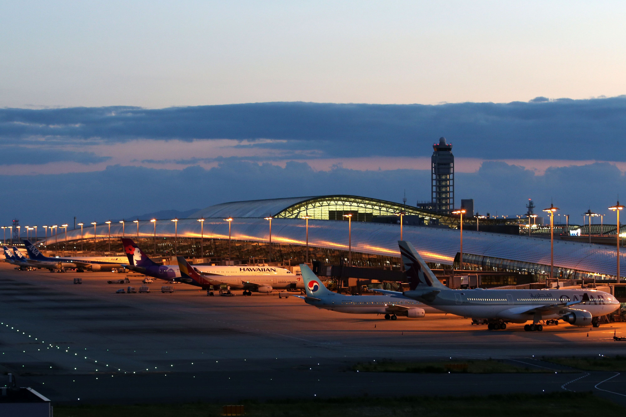 Ex-Nissan chief Carlos Ghosn's dramatic escape highlighted not only the security holes at Kansai International Airport, but also the lax treatment VIPs receive when entering or departing Japan on private jets. | BLOOMBERG