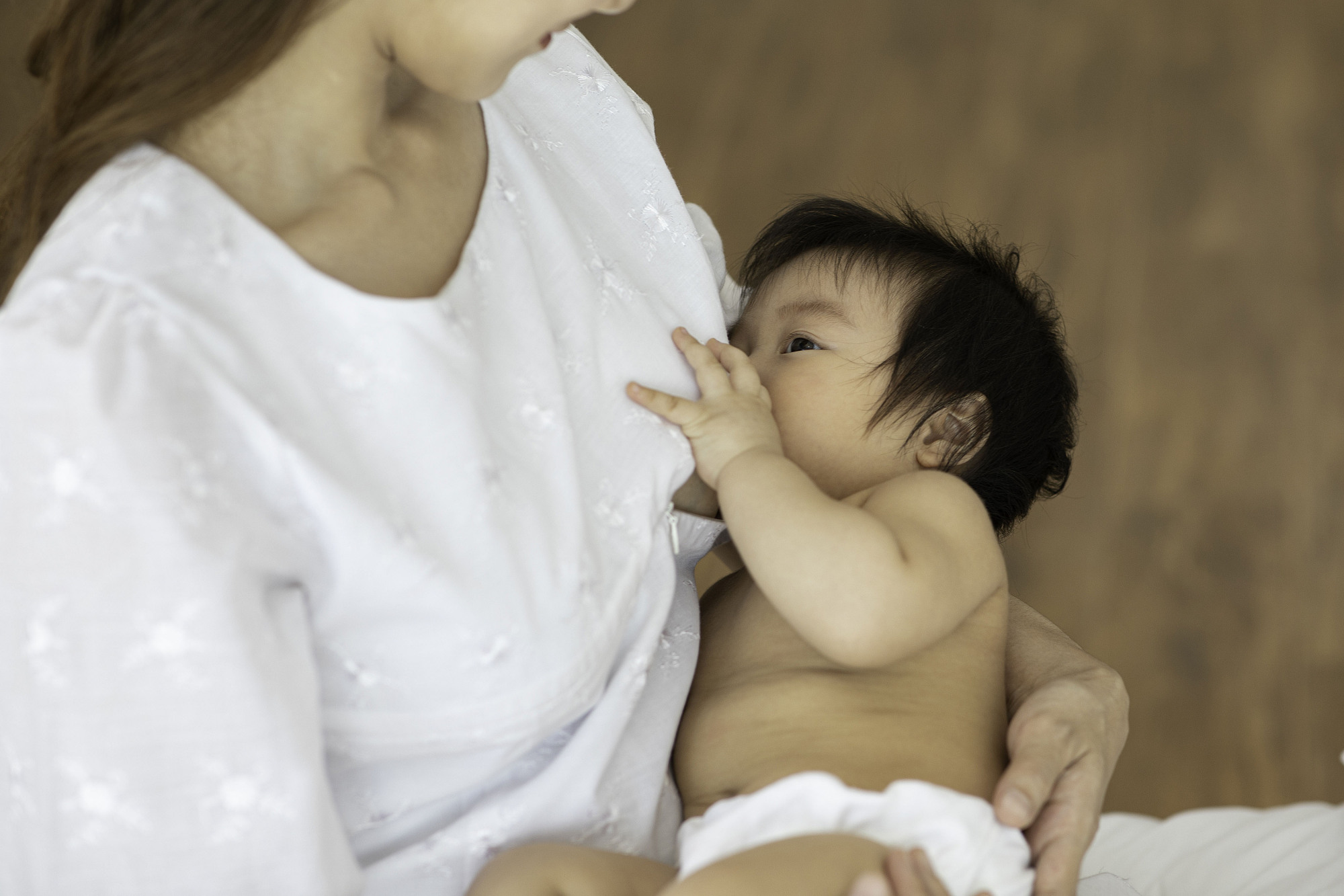 'Lactivist' Midori Ogino says successful breast-feeding isn't a matter of luck but rather the product of practical knowledge and social support. | GETTY IMAGES