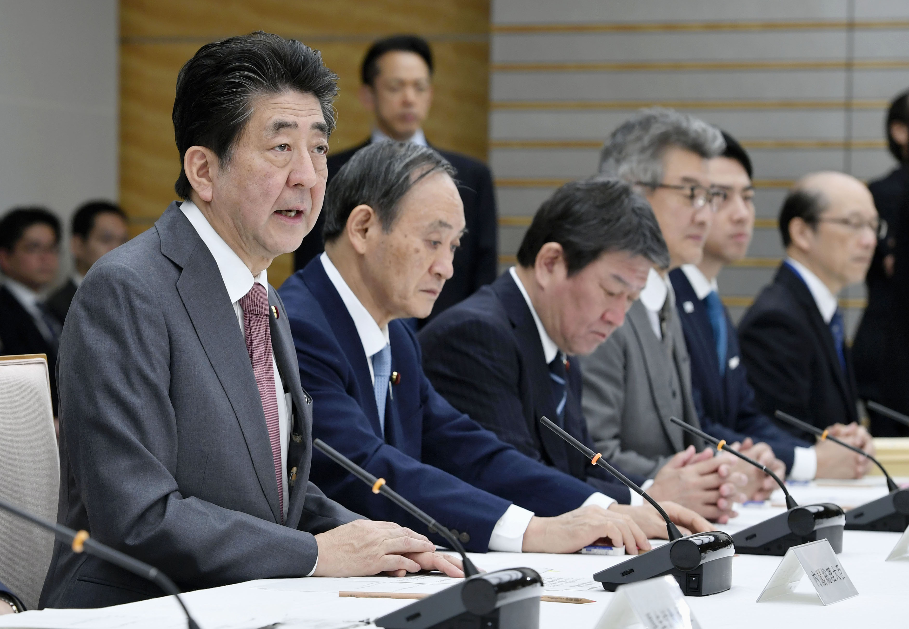 Prime Minister Shinzo Abe speaks at his office in Tokyo Friday during a government meeting on steps to deal with China’s deadly new coronavirus.  | KYODO