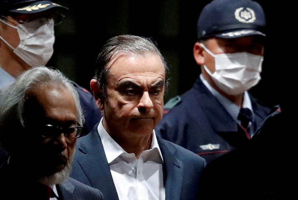 Former Nissan Chariman Carlos Ghosn leaves the Tokyo Detention House last April. | REUTERS