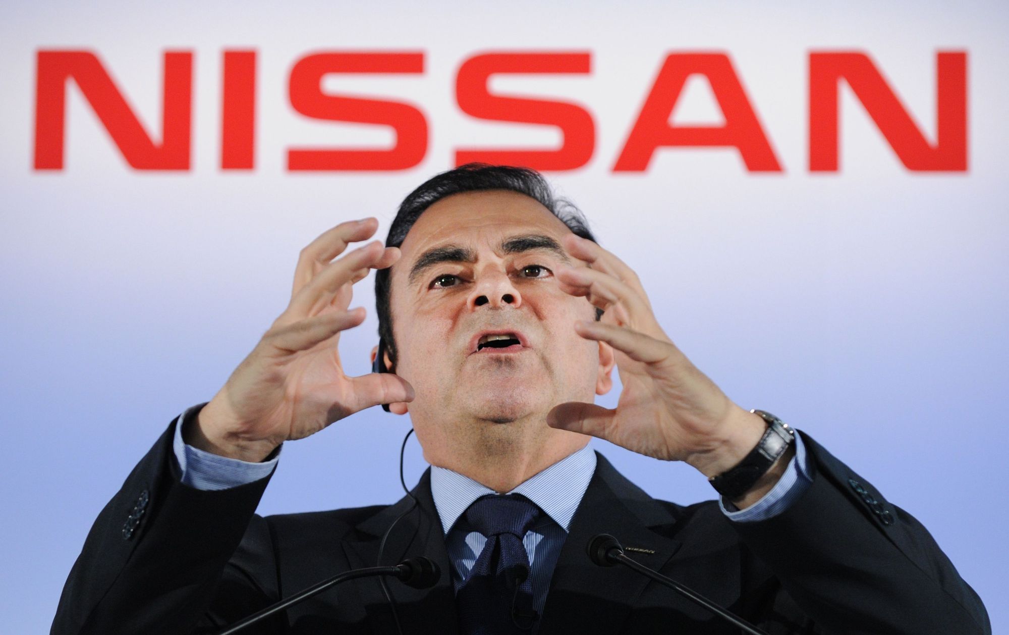 Carlos Ghosn, then head of Nissan, answers questions during a news conference at the carmaker's headquarters in Yokohama in May 2012. | AFP-JIJI