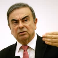 Former Nissan Chairman Carlos Ghosn gestures during a news conference in Beirut on Jan. 8. | REUTERS