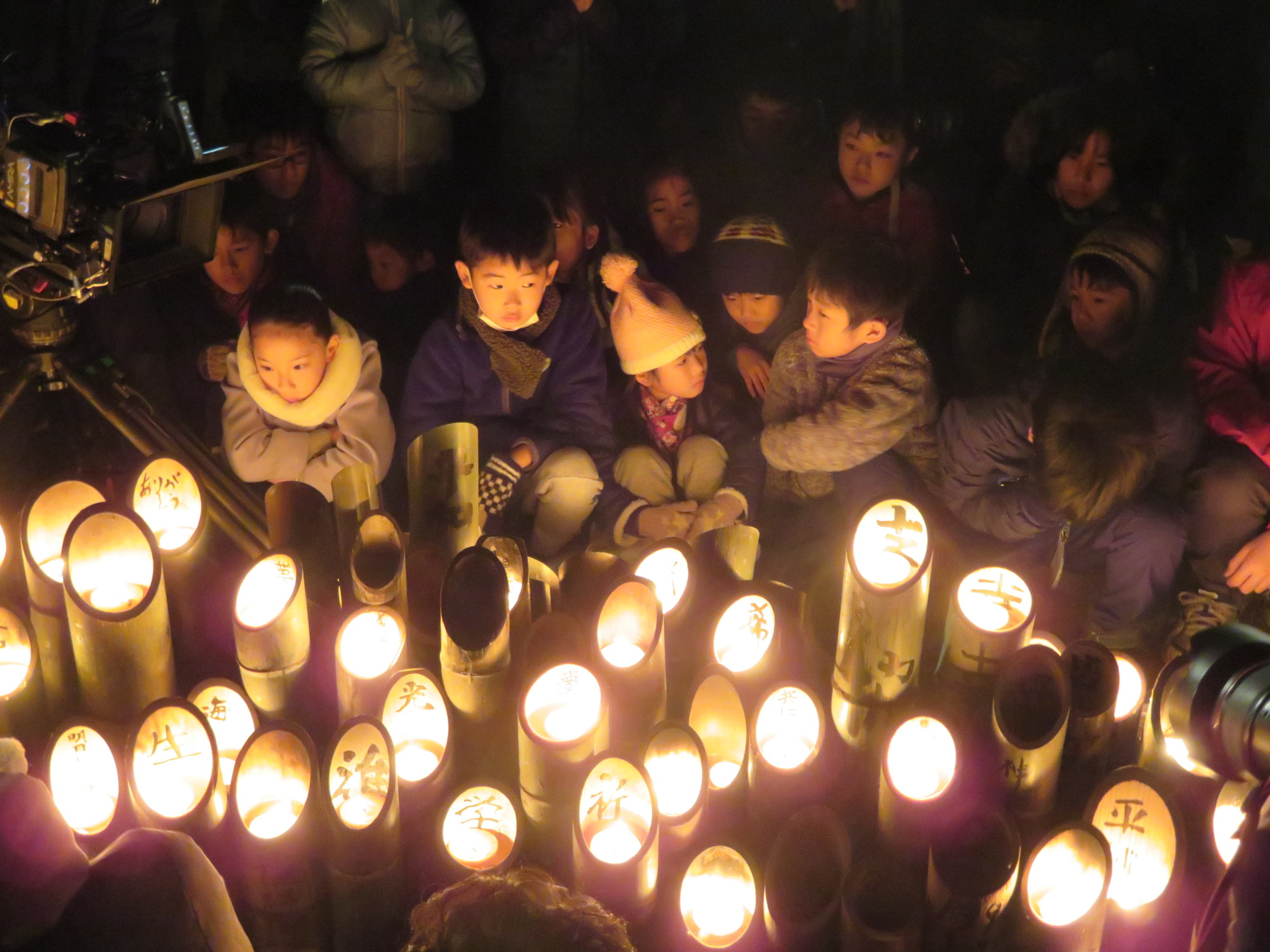People gathered at a park in central Kobe early Friday to remember the more than 6,400 victims of the Great Hanshin Earthquake, which struck the region on Jan. 17, 1995. | ERIC JOHNSTON