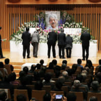 People honor Dr. Tetsu Nakamura, a famed humanitarian aid doctor slain in Afghanistan, at a farewell ceremony held Saturday in the city of Fukuoka. | KYODO