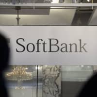 The Tokyo District Court ordered mobile service provider SoftBank Corp. last month to disclose the number together with the name, home address, and email address of a person who posted defamatory comments online about a real estate company in Tokyo. | BLOOMBERG