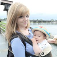 By the river: Lian McGillycuddy heads out with her son for a walk by the water. | COURTESY OF LIAN MCGILLYCUDDY