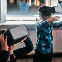 Audience members take part in \"HexenHuttenTraumPalaste\" (2018-19), an interactive exhibition of fairy-tale architecture, art directed by Hiroko Tanahashi and Max Schumacher. | COURTESY OF POST THEATER