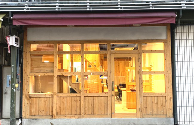 Keeping it simple: Vegan Store's aesthetic is unfussy, with exposed wooden beams and a semi-open kitchen. | COURTESY OF VEGAN STORE