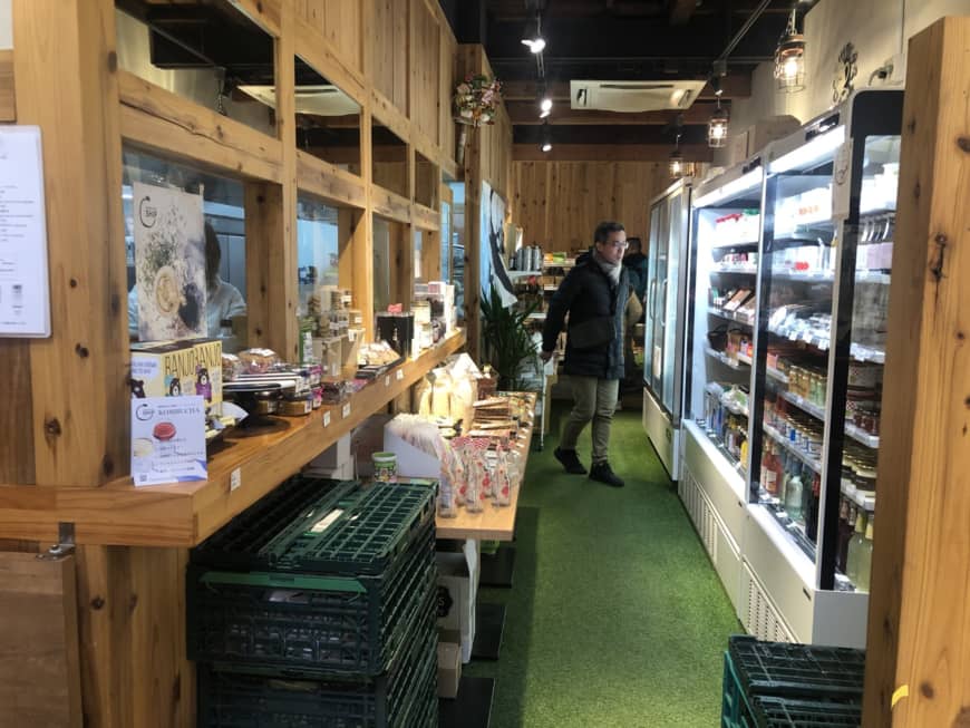 Veganism on the rise: A customer peruses Vegan Store's shelves | JANE KITAGAWA