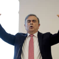 Media circus: Former Nissan CEO Carlos Ghosn says he saw himself as possibly being a prisoner of Japan for the rest of his life. | AFP-JIJI