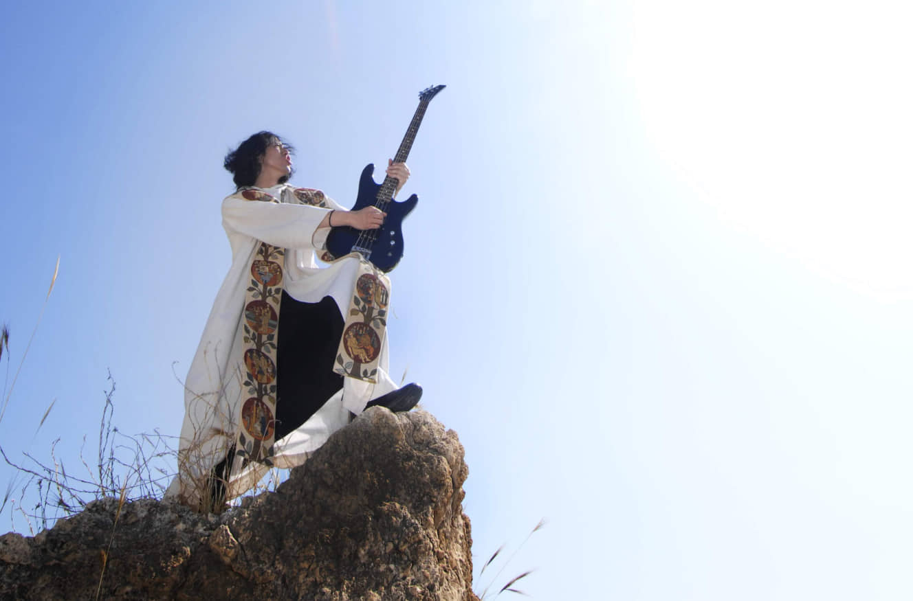Pastor Kazuhiro Sekino of Tokyo Lutheran Church plays bass guitar in Boxi Rocks, a band of ministers, as well as solo for other performances. | HIDEMI OGATA