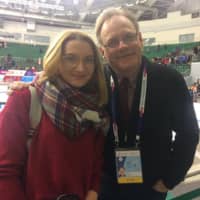 Announcer Ted Barton poses with a fan at the Russian Championships last month in Krasnoyarsk. | INSTAGRAM