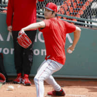 A rule change for the 2020 season will allow Shohei Ohtani to pitch in the minor league as he continues to bat for the Angels. | KYODO