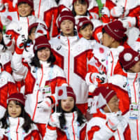 Japan\'s athletes participate in the opening ceremony of the 2020 Winter Youth Olympics in Lausanne, Switzerland, on Thursday. The global extravaganza runs through Jan. 22. | GETTY IMAGES / VIA KYODO