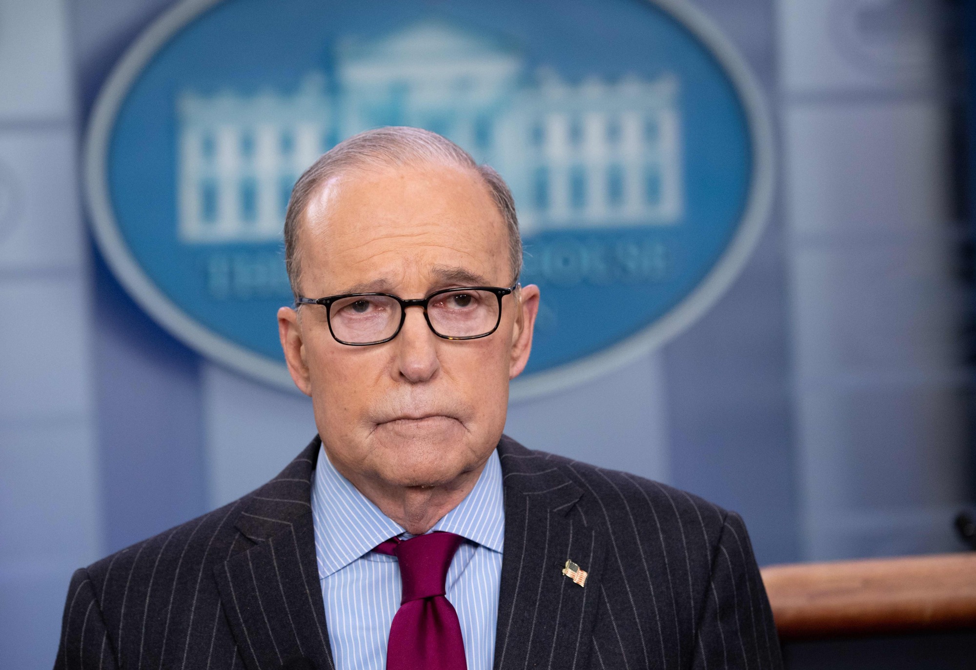 Larry Kudlow, director of the National Economic Council, speaks during a television interview in the Brady Press Briefing Room of the White House in Washington Jan. 29. The new coronavirus outbreak in China will delay Beijing's plans to purchase goods from the United States under the terms of a trade deal, the top U.S. trade official said Tuesday. | AFP-JIJI