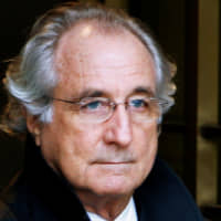 Bernard Madoff exits the Manhattan federal court house in New York in 2009. | REUTERS