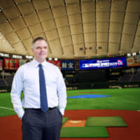 Jim Murren, chairman and chief executive officer of MGM Resorts International, poses for a photo at the Tokyo Dome following an interview in March 2019. Murren plans to step down at a time when the casino company is trying to cope with fallout from the coronavirus scare. | BLOOMBERG